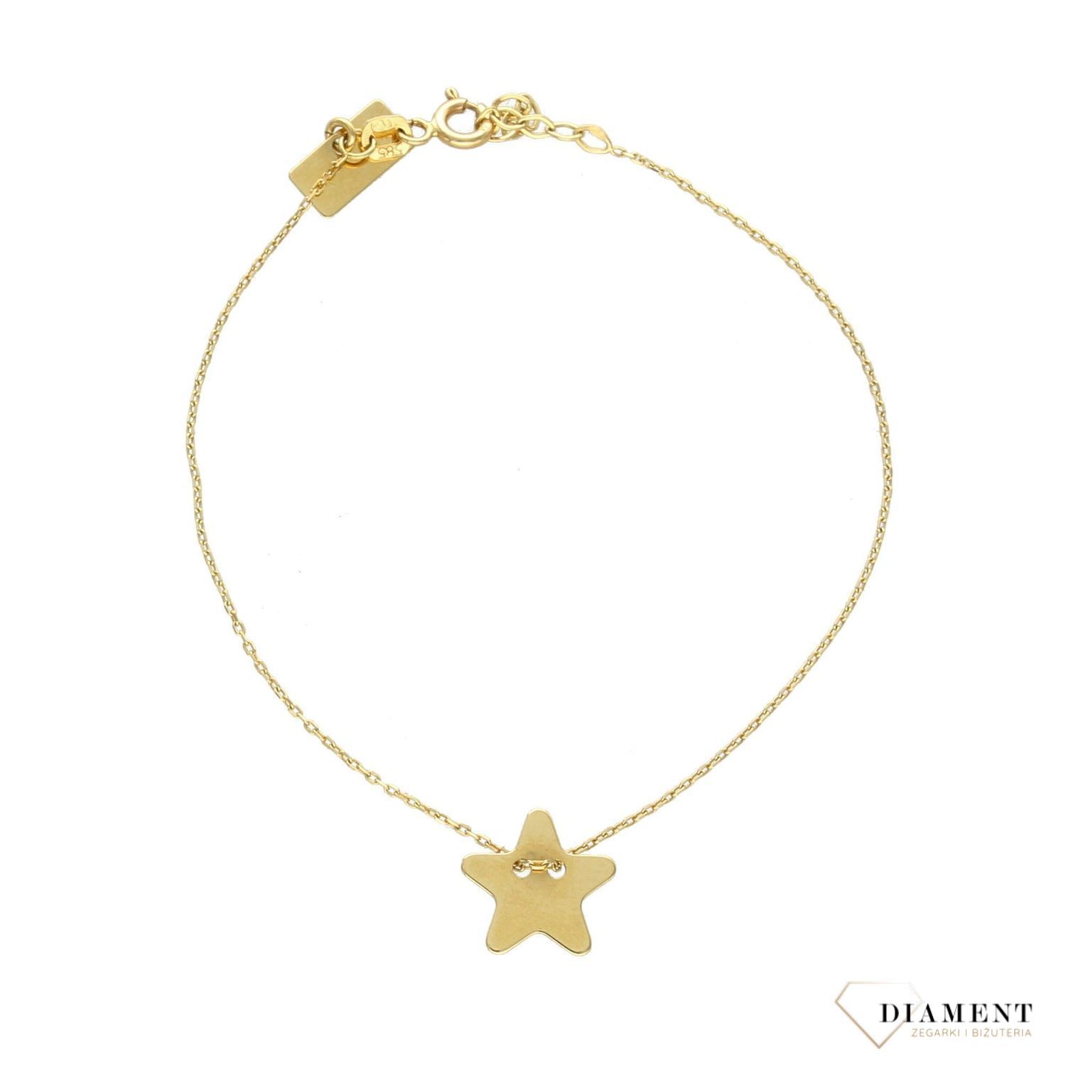 Złota bransoletka celebrytka z motywem gwiazdki. Złota bransoletka została wykonana z najwyższej jakości złota próby 585. Idealna na prezent.  (2).jpg